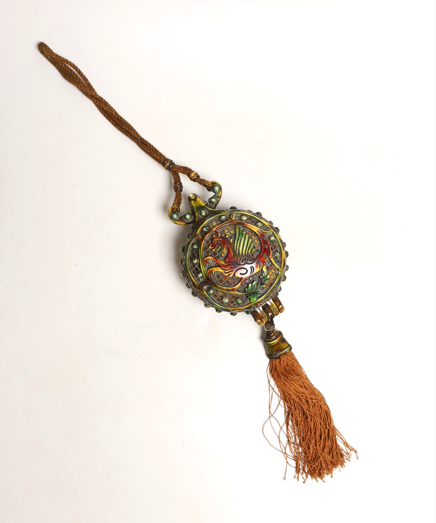 A spherical Cross purse